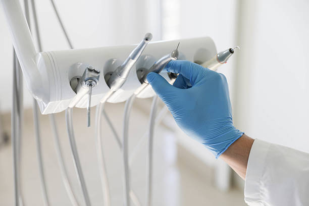 Professional Tooth Extraction technician working in Orangeville, UT
